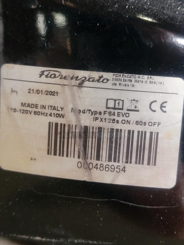 Label on Fiorenzato F64 Evo Espresso Grinder showing model, make, power details, and serial number. Made in Italy.