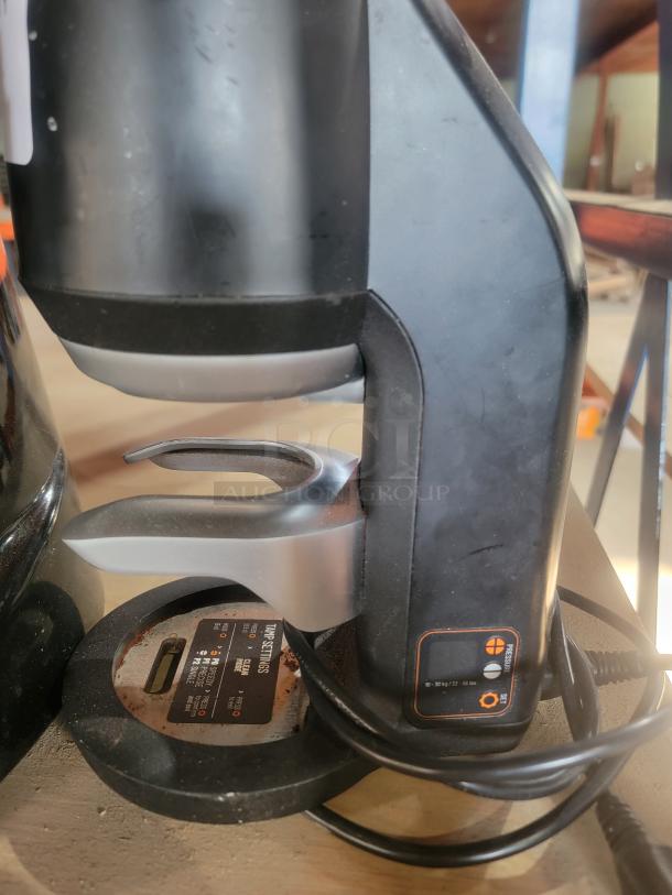 PUQpress mini Gen 5 automatic coffee tamper, model 7-000-0400-1, professional-grade, shown in good condition.