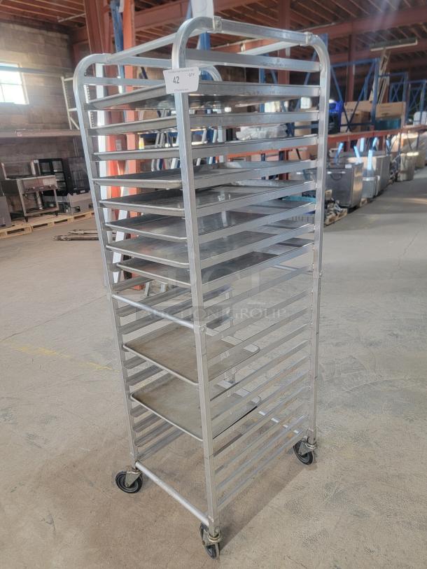 Regency 18-Pan Aluminum Bun Pan Rack with visible wear, full size, mobile with wheels, ideal for commercial kitchens.