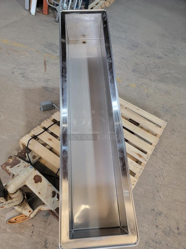 Atlas Metal WCMDCL-3 refrigerated drop-in cold well on a pallet, slim-line design, ideal for commercial kitchens.