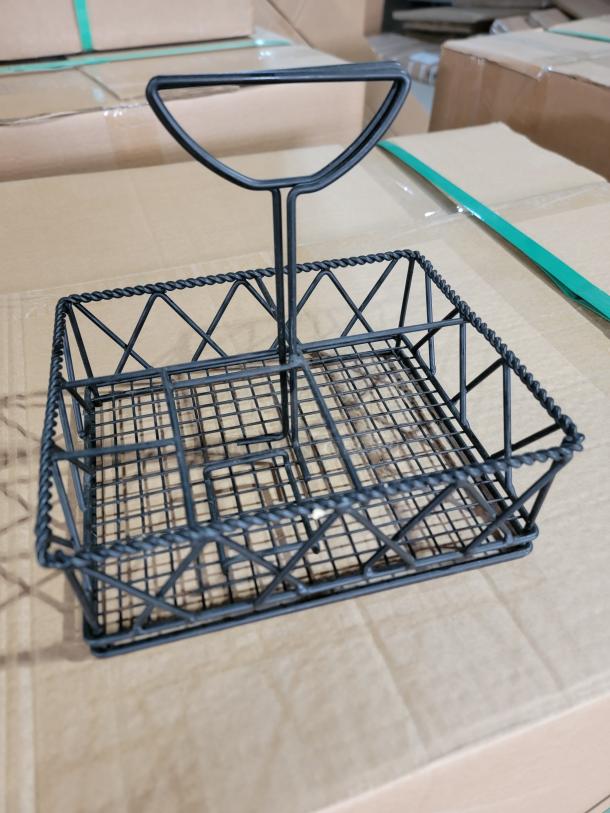 Lot of 16 black metal 5-compartment condiment caddies shown, featuring a durable wireframe design, ideal for restaurant use.