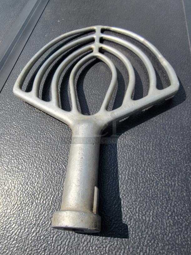 Hobart S-60B mixer beater attachment, heavy-duty metal, visible "Hobart" marking, slightly worn, for stand mixer use.