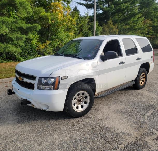 White 2012 Chevrolet Tahoe 4x4, well-maintained, 136,880 miles. Retired emergency vehicle, new battery, alternator.