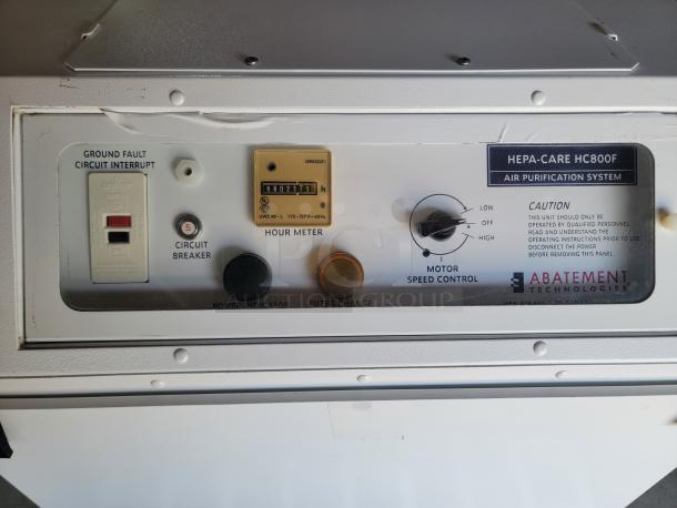 Abatement Technologies Hepa-Care HC800F air purifier control panel. Features motor speed control, hour meter, and circuit breaker.