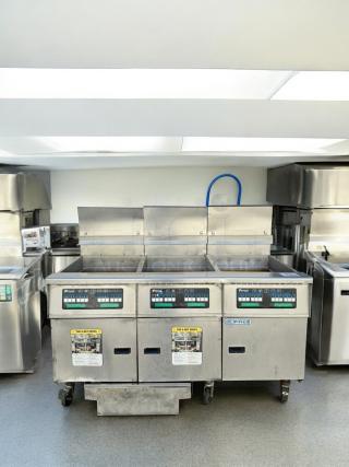 Pitco SSH75 Triple-Bank Gas Fryer in excellent condition, natural gas, 115V ignition, fully tested, visible controls and safety labels.