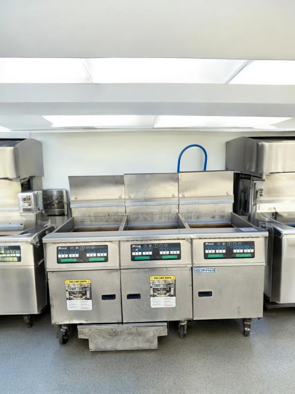 Pitco SSH75 Triple-Bank Gas Fryer, natural gas, 115V ignition, excellent condition, fully tested and working, with control panels.