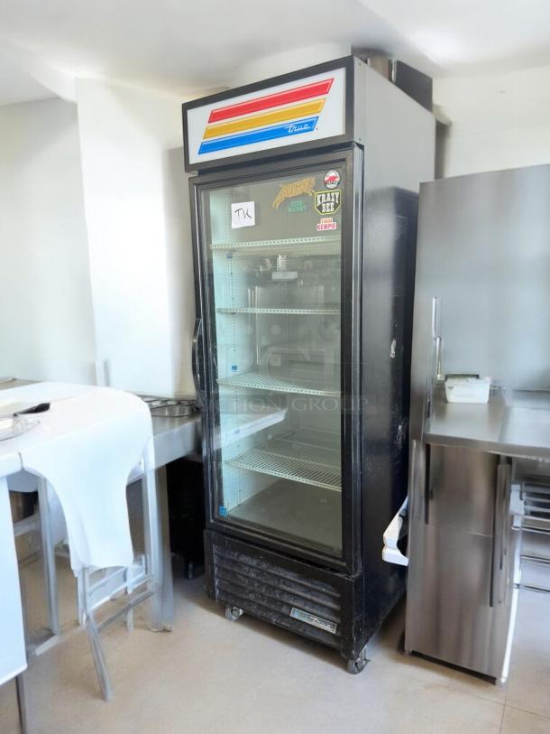 True QDM-23-HC glass door merchandiser refrigerator, 1-door upright, excellent condition, tested and working, True logo visible.