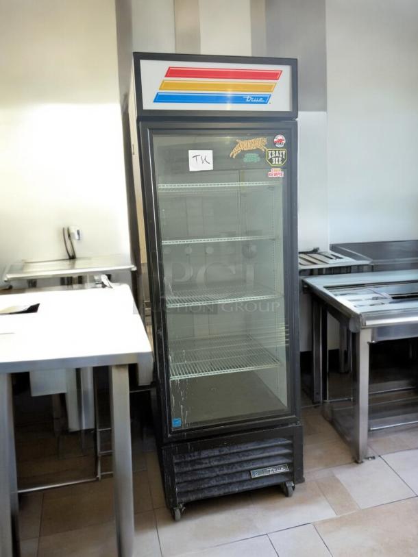 True QDM-23-HC 1-door glass merchandiser fridge, excellent condition, fully tested, True branding, visible stickers.