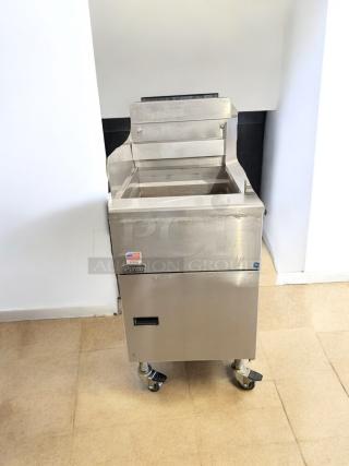 Pitco SG18 natural gas fryer, floor model, excellent condition. Fully tested and working with visible logo and wheels.