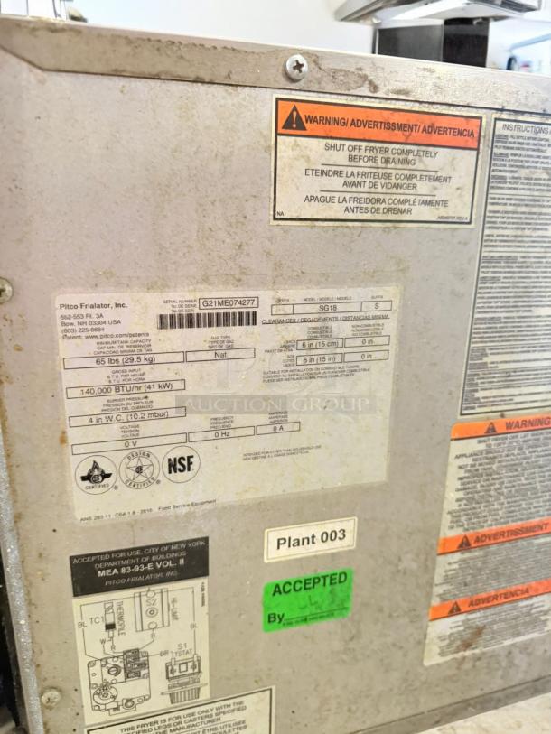 Pitco SG18 Gas Fryer in excellent condition, natural gas, floor model, fully tested. Features safety and instruction labels.