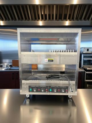 Double-deck electric cheese melter in excellent condition, model Dual-Level, fully tested, 120V, with control panel visible.