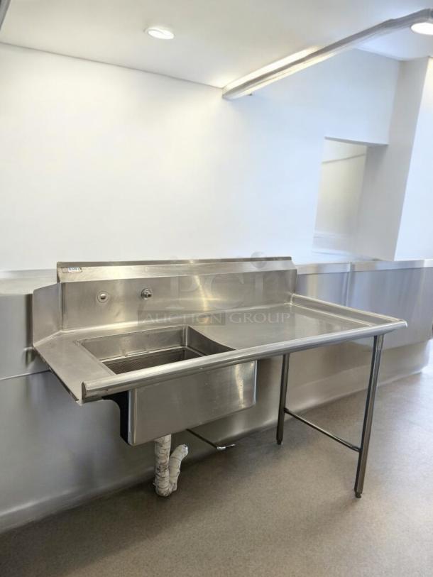 GSW stainless steel single-compartment sink with left drainboard, excellent condition, NSF certified, commercial use.