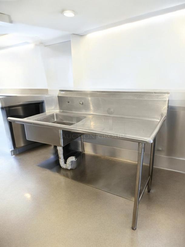 Stainless steel commercial sink by GSW with left drainboard, excellent condition, NSF certified, single-compartment.