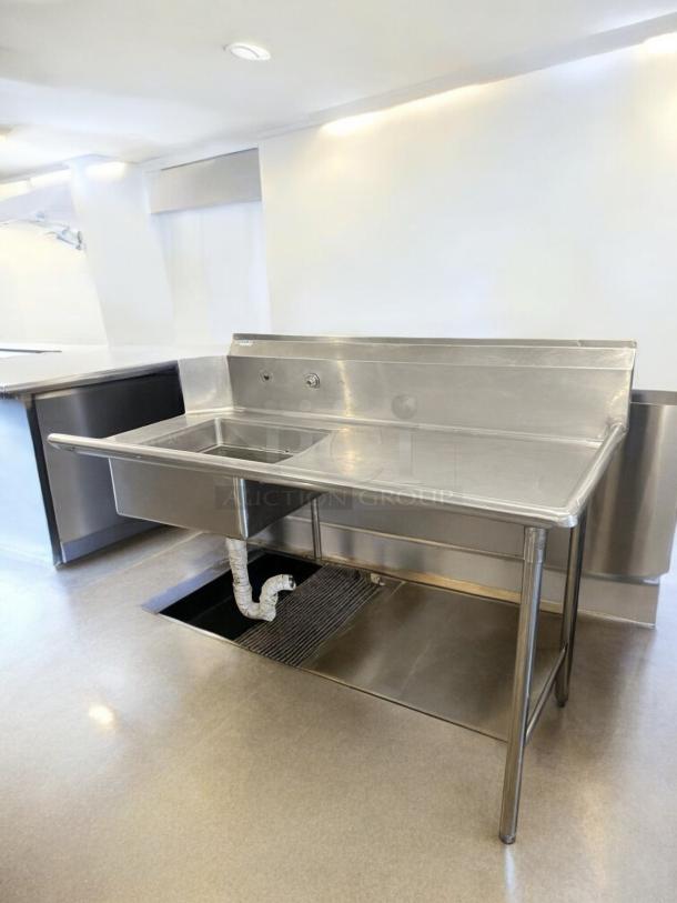 Excellent condition GSW stainless steel single-compartment commercial sink with left drainboard, NSF certified.