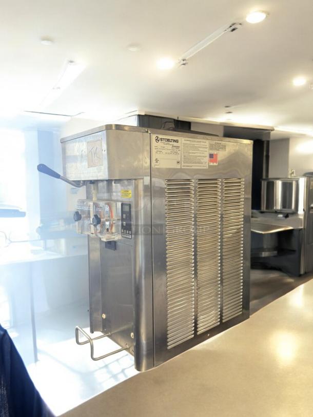 Stoelting F111-381D soft serve machine in excellent condition, 208-230V, tested and working, visible labels and controls.