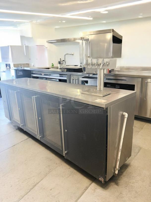 Beverage-Air back bar cooler with 4 glass doors, draft beer tower, excellent condition, 115V, fully tested, stainless steel.