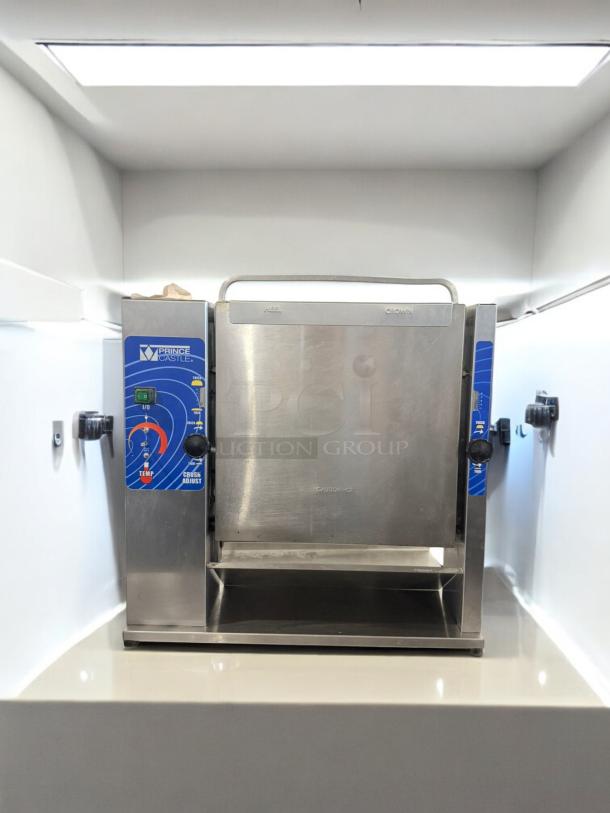 Prince Castle 297-T20 bun toaster in excellent condition, 115V. Features adjustable controls and stainless steel body. Fully tested.