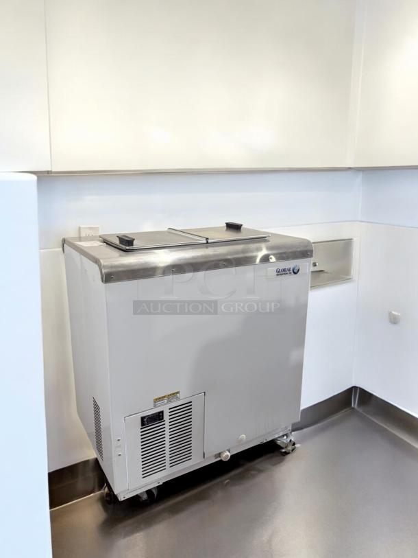 Global Refrigeration ice cream freezer with stainless steel top, in excellent condition. Model: Commercial Dipping Cabinet, 115V.