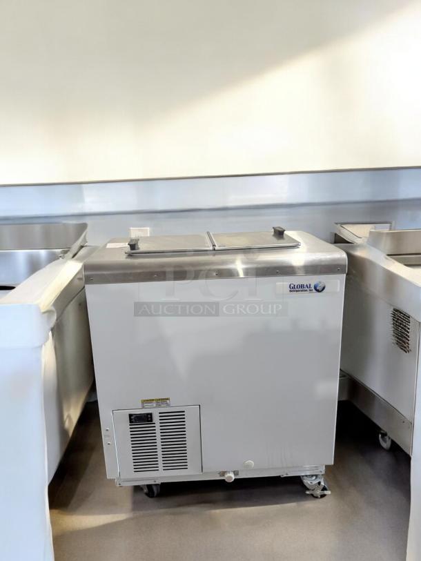 Global Refrigeration ice cream freezer, excellent condition, stainless steel top, model commercial dipping cabinet, 115V, fully tested.