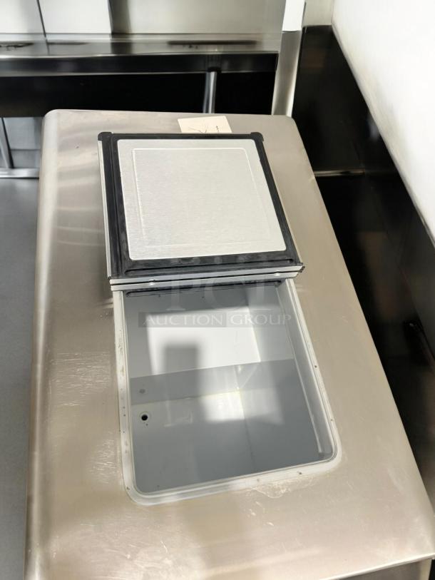 Stainless steel Global Refrigeration ice cream freezer with open top, excellent condition, 115V, fully tested and working.