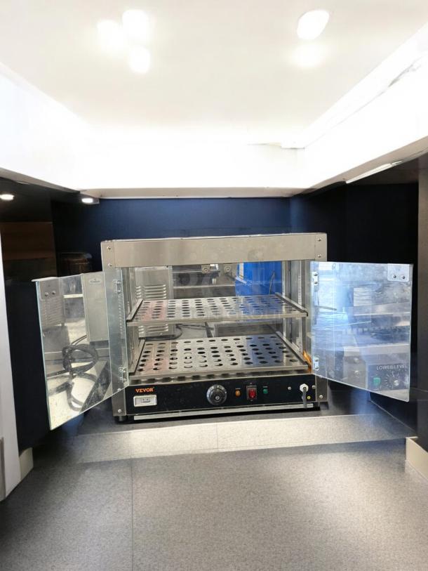 Vevor Countertop Heated Display Case, excellent condition, 120V, glass doors, fully tested, model control panel visible.