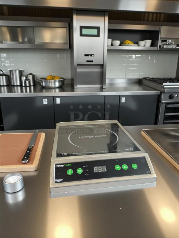 Vollrath Mirage Cadet Induction Range 59300, 120V, 1800W. Excellent condition, fully tested. LED display, touch controls.