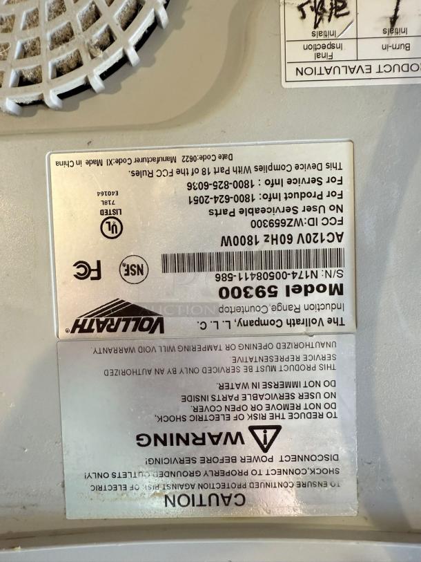 Label of a Vollrath Mirage Cadet Induction Range, Model 59300, showing certifications and safety warnings.
