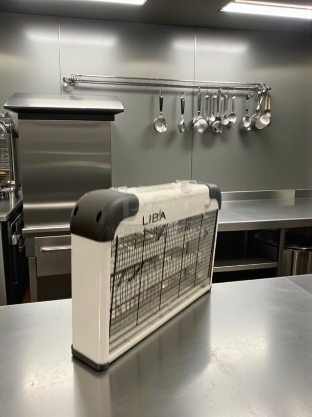 LIBA Electric Bug Zapper in excellent condition, 2800V grid, fully tested, model shown on stainless steel countertop.