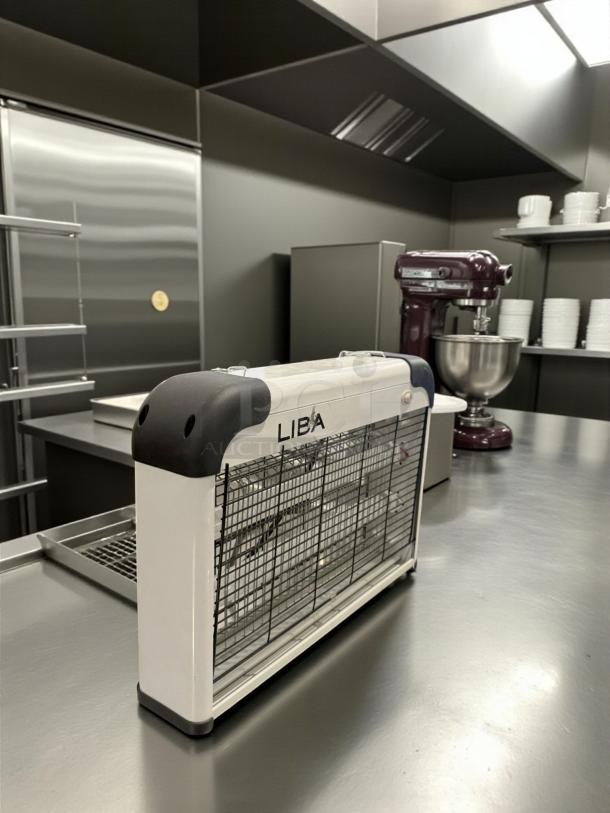 LIBA Electric Bug Zapper in excellent condition on a kitchen counter, features a 2800V grid, fully tested and working.