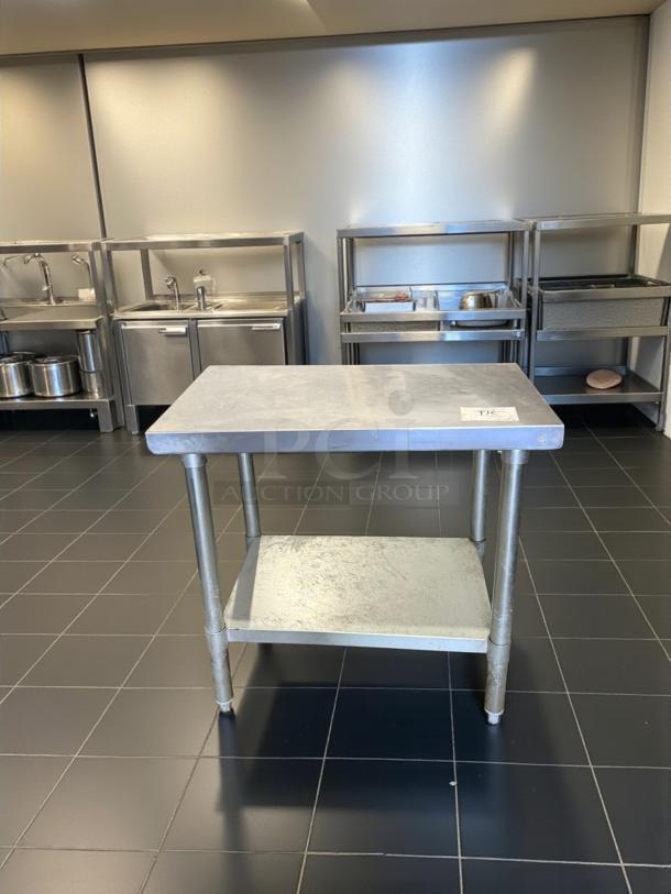Standard Commercial stainless steel work table with undershelf. Excellent condition, fully tested and working. Model: Prep/Utility.