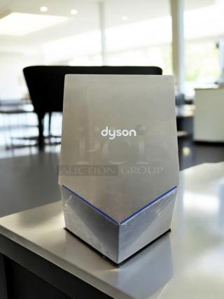 Dyson Airblade V Hand Dryer HU02, excellent condition, 120V, fully tested, silver finish, logo visible on front.