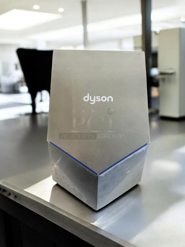 Dyson Airblade V Hand Dryer HU02, excellent condition, 120V, fully tested and working, sleek gray design with visible logo.