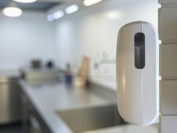 Ecolab touch-free automatic soap/sanitizer dispenser, wall-mounted, excellent condition, fully tested and working.