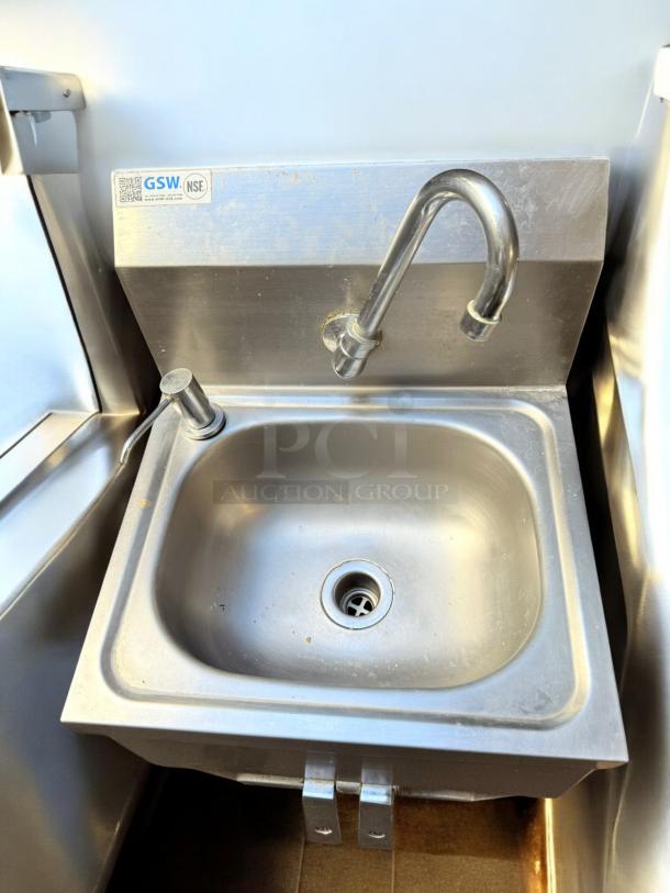 GSW stainless steel wall-mount hand sink with faucet in excellent condition. Fully tested, with visible GSW label.