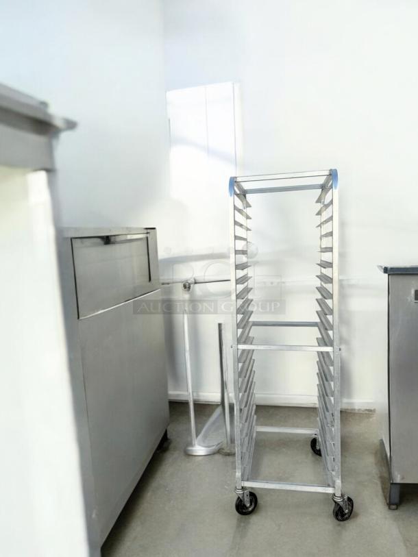 Commercial grade aluminum 20-sheet pan rack in excellent condition, mobile with casters. Fully tested and working.