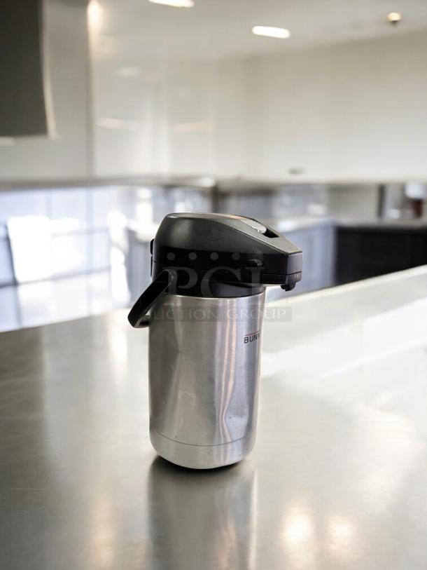 Bunn Stainless Steel Lever-Action Airpot, 2.5L, excellent condition, fully tested, sleek design, prominently marked with "Bunn."