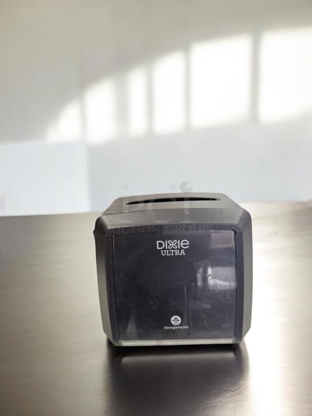 Georgia-Pacific Dixie Ultra tabletop napkin dispenser in excellent condition, black, fully tested and working.