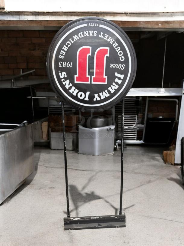 Jimmy John’s double-sided illuminated sign, electric, excellent condition, fully tested. Distinctive logo and text.