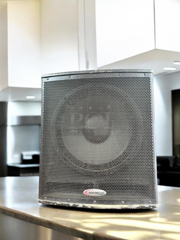 Harbinger HP118S powered subwoofer with top speaker, 700W, excellent condition, fully tested, logo visible on front grille.