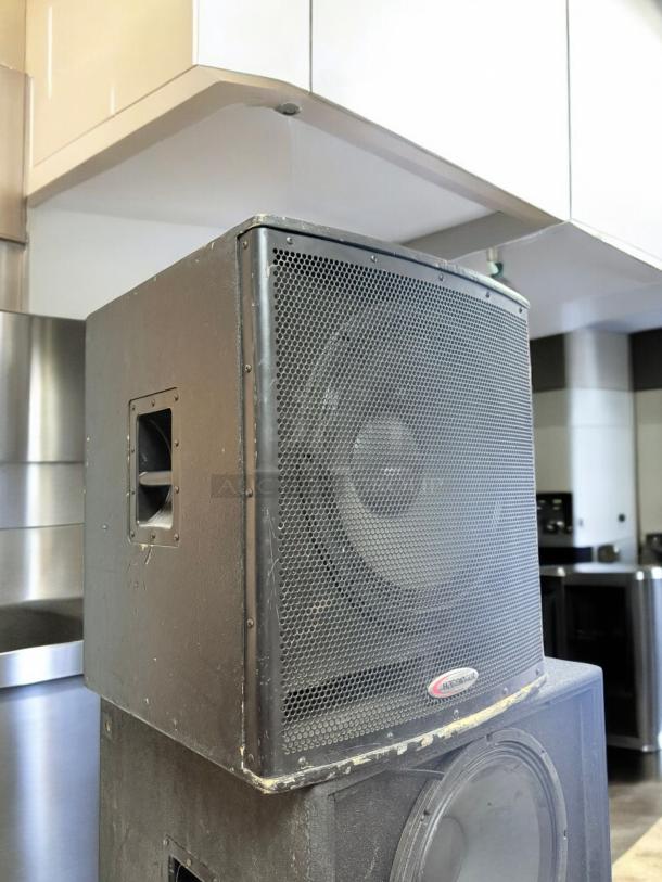 Harbinger HP118S powered subwoofer with top speaker, excellent condition, 700W, fully tested, minor edge wear visible.