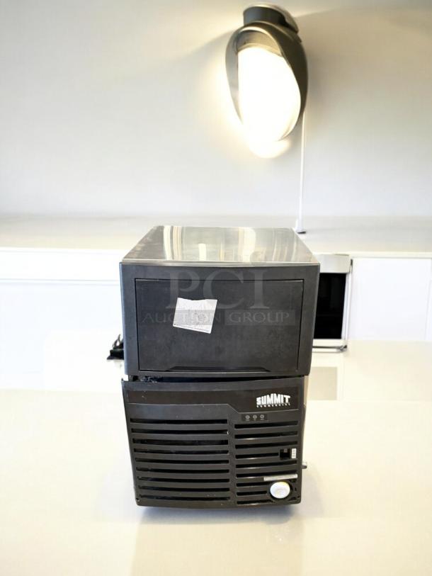 Summit BIM100 Commercial Ice Maker, excellent condition, 115V, fully tested, black finish, model label visible.