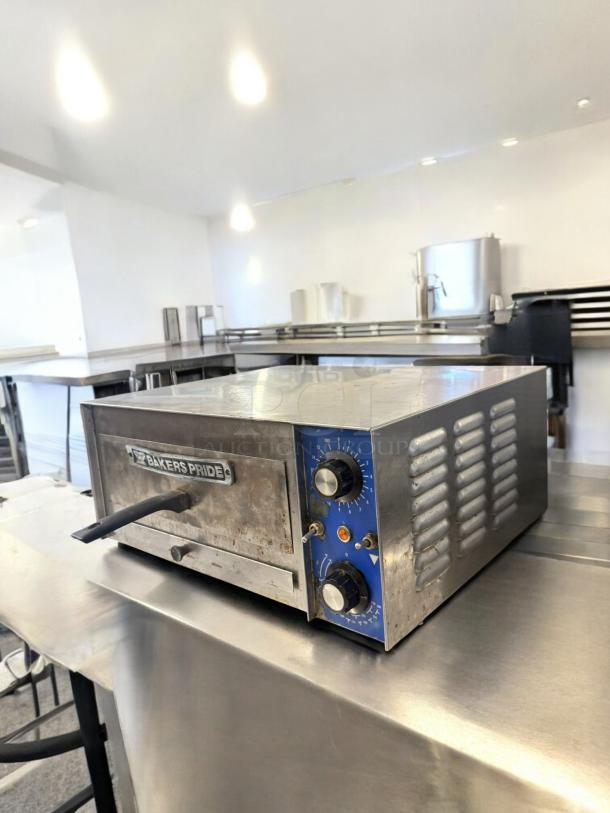 Bakers Pride PX14 countertop pizza oven in excellent condition, 120V, with dual control knobs, fully tested and working.