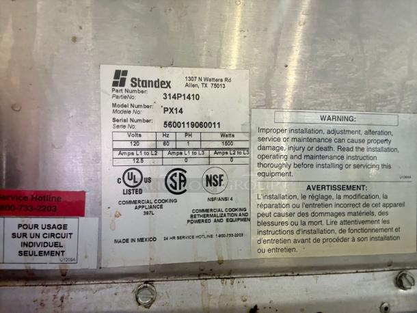 Alt text: Bakers Pride PX14 countertop pizza oven label, model PX14, 120V, tested and working, warning details included.