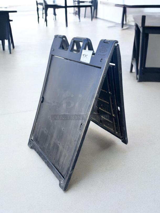 Black Signicade Deluxe Plastic A-Frame Sign, 24"x36", excellent condition, durable construction, ideal for sidewalk displays.