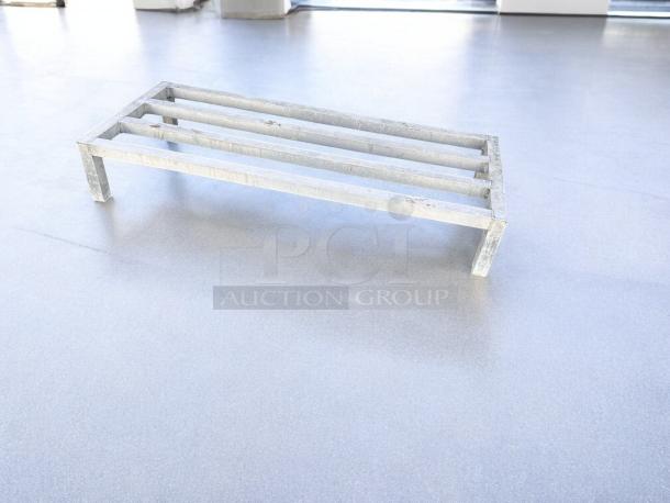 Heavy-duty aluminum dunnage rack, 60" x 20" x 12", in excellent condition. Fully tested and working.