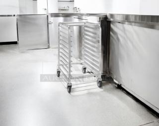 Mobile aluminum 10-slot pan rack with casters in excellent condition, commercial quality, fully tested and functional.