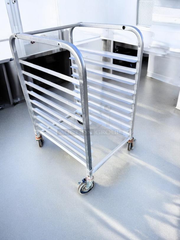 Commercial Quality aluminum 10-slot pan rack, mobile with casters, excellent condition, fully tested and working.