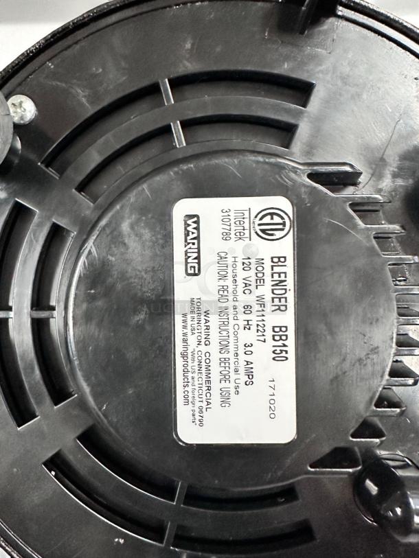 Waring BB150 Commercial Blender base, model VM1127I, 120V label, showing certification and usage instructions.