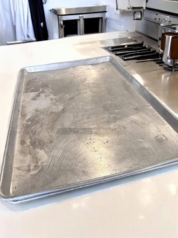 Commercial Grade full-size aluminum sheet pan, 18" x 26", excellent condition, tested, quantity 45 available.