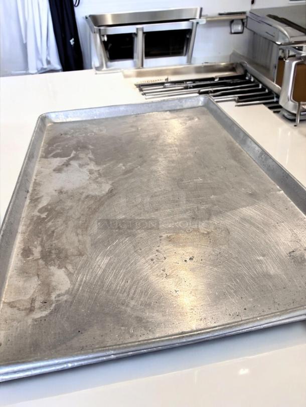 Commercial full-size aluminum sheet pan, 18"x26", excellent condition, durable construction, quantity 45, fully tested.